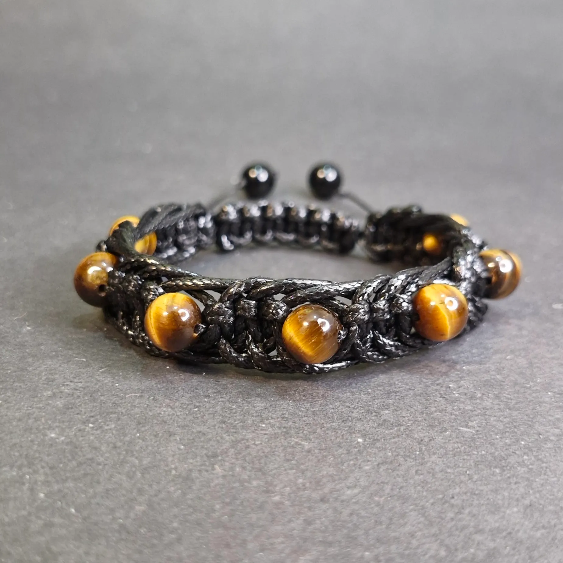 دستبند بافت چرم چشم ببر